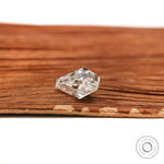 Colorless coffin shaped moissanite gemstone with step cut design