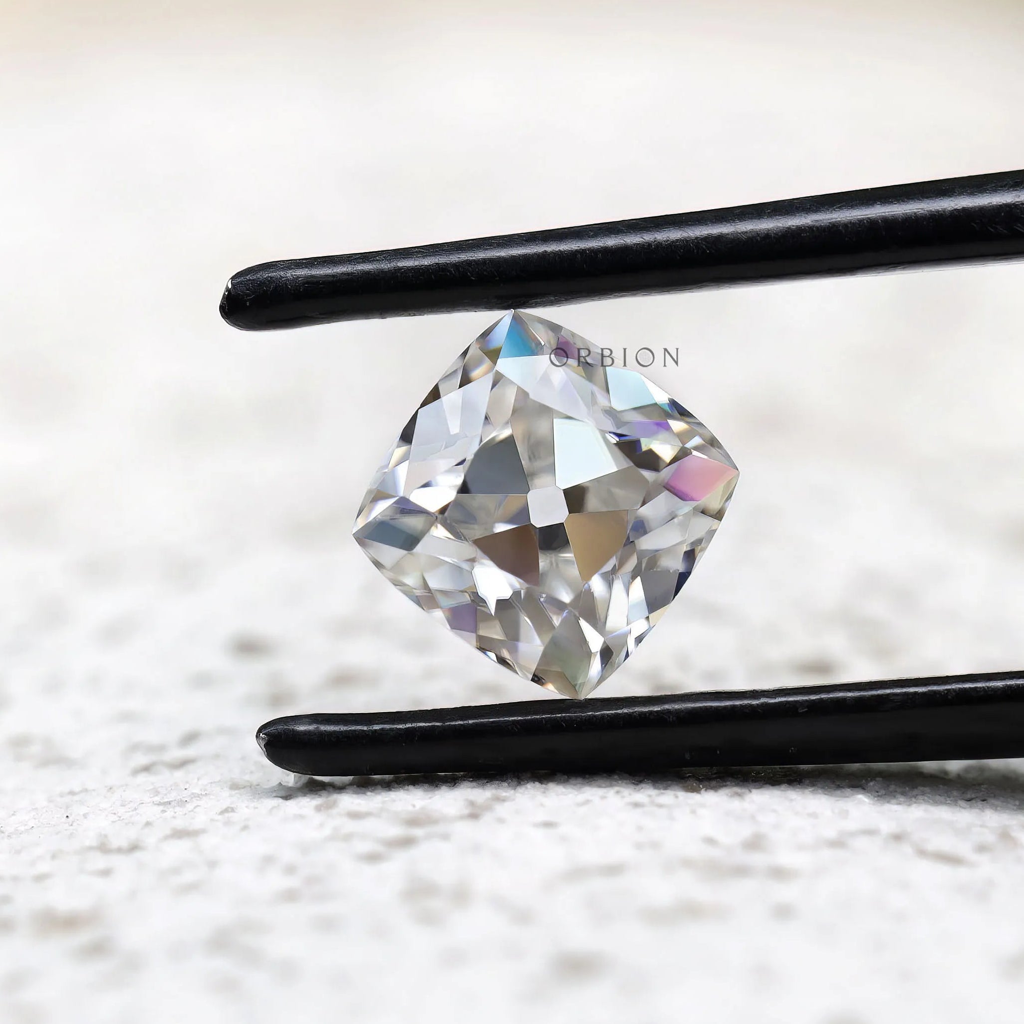 Square cushion moissanite with precise faceting detail
