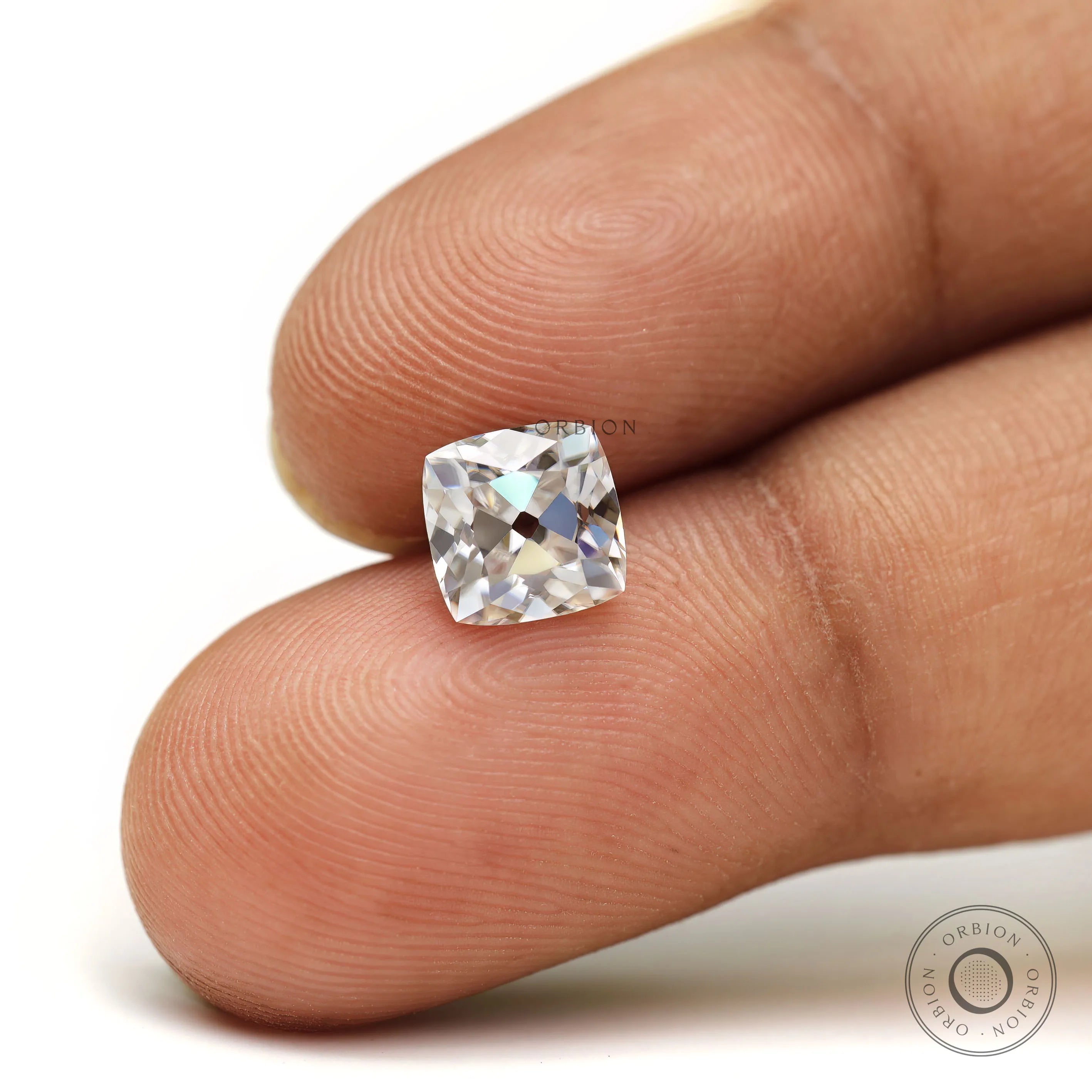 Close view of cushion Peruzzi moissanite brilliance