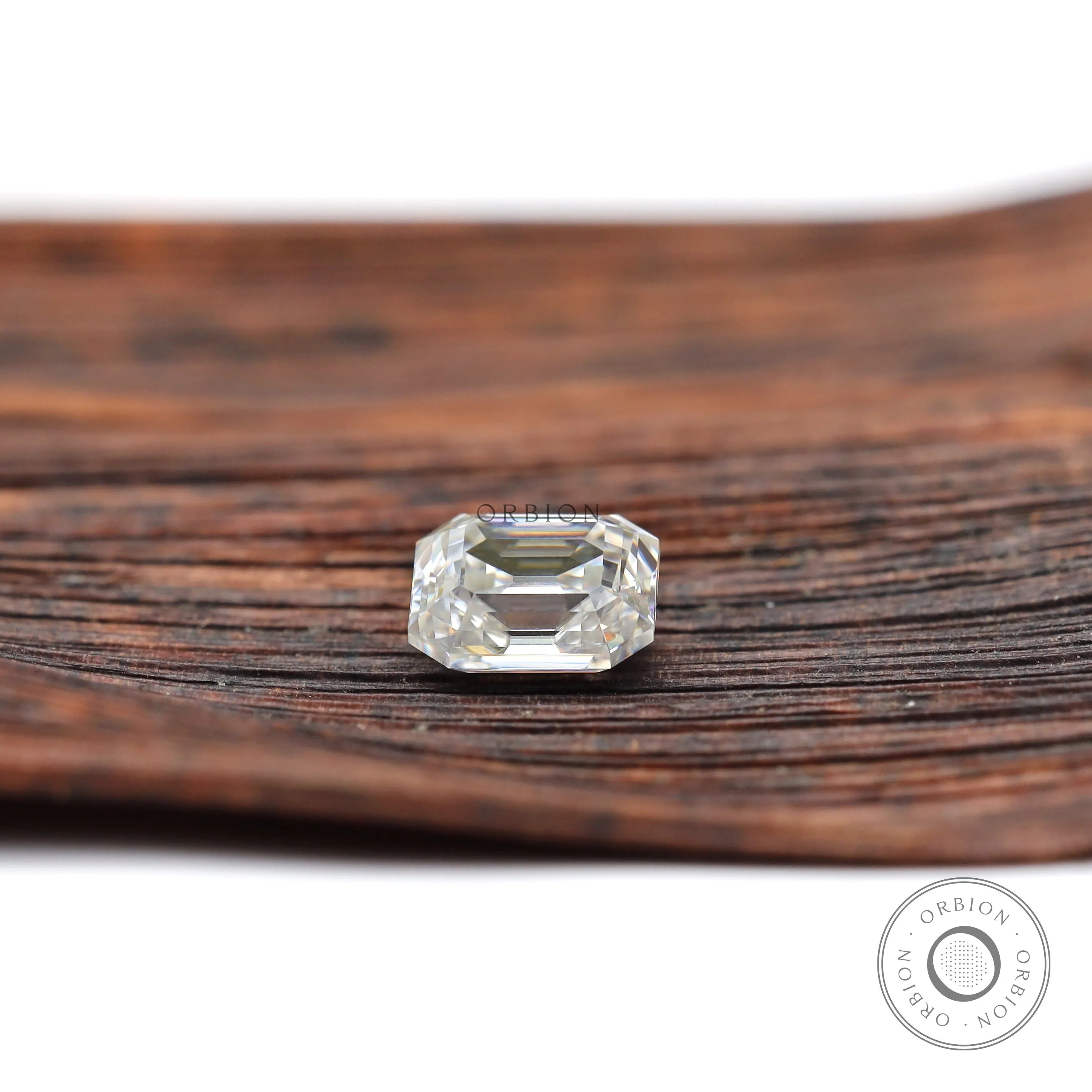 Colorless moissanite elongated asscher shape with visible open culet