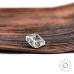 Elongated asscher moissanite gemstone with antique old mine style cut