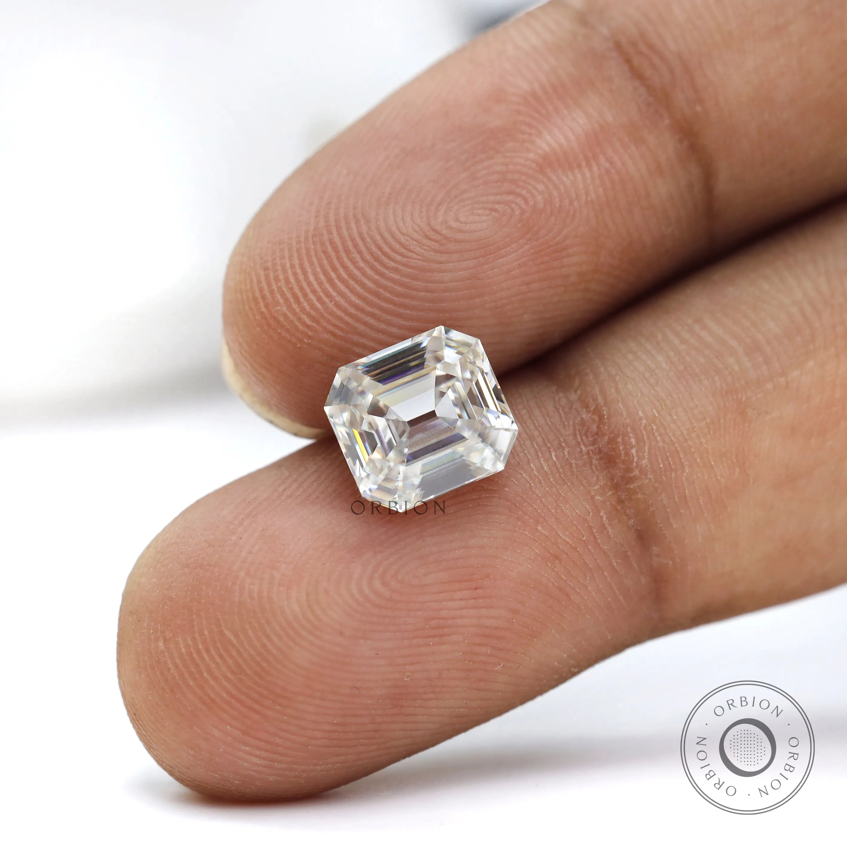 OMC style elongated asscher moissanite with open culet detail