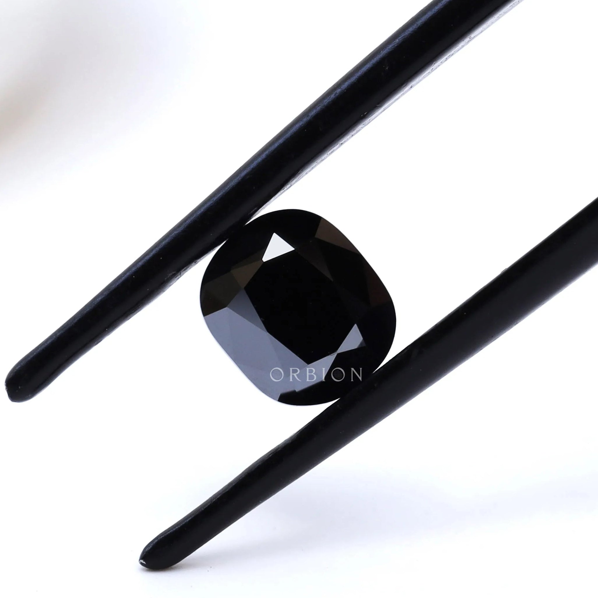 Elongated cushion black moissanite 1.2 ct with old mine faceting