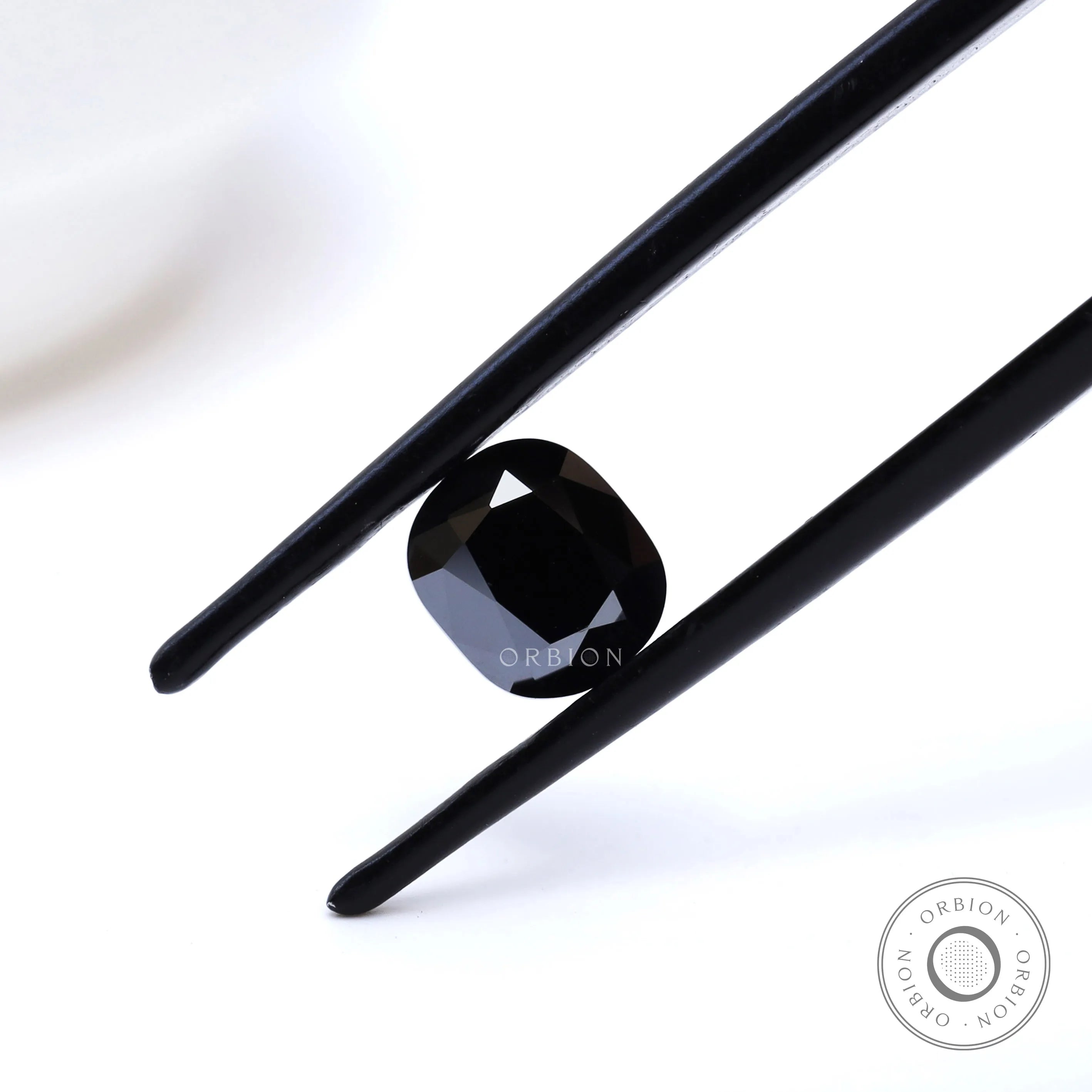 Elongated cushion black moissanite 1.2 ct with old mine faceting