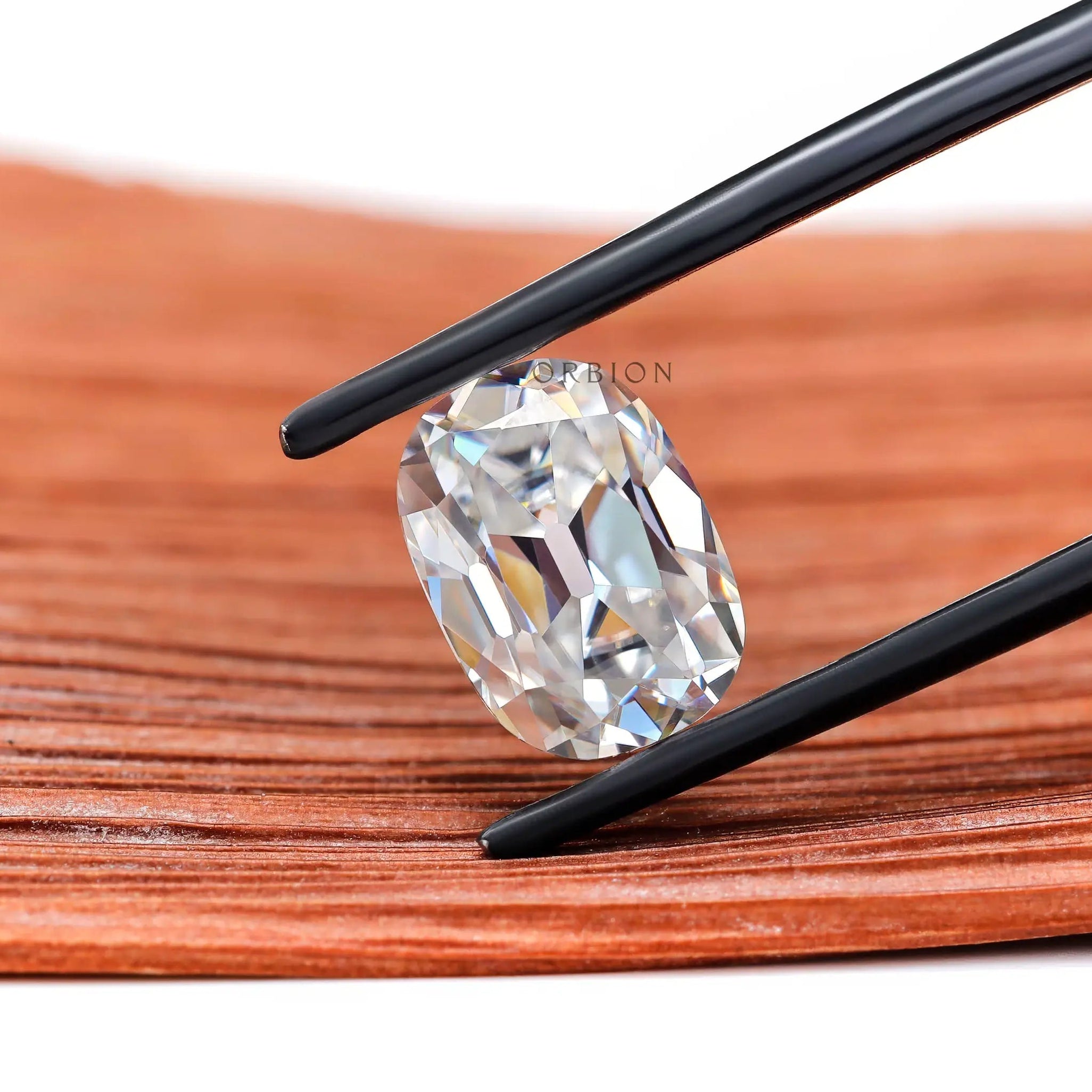 Larger facests of old cut cushion moissanite stone