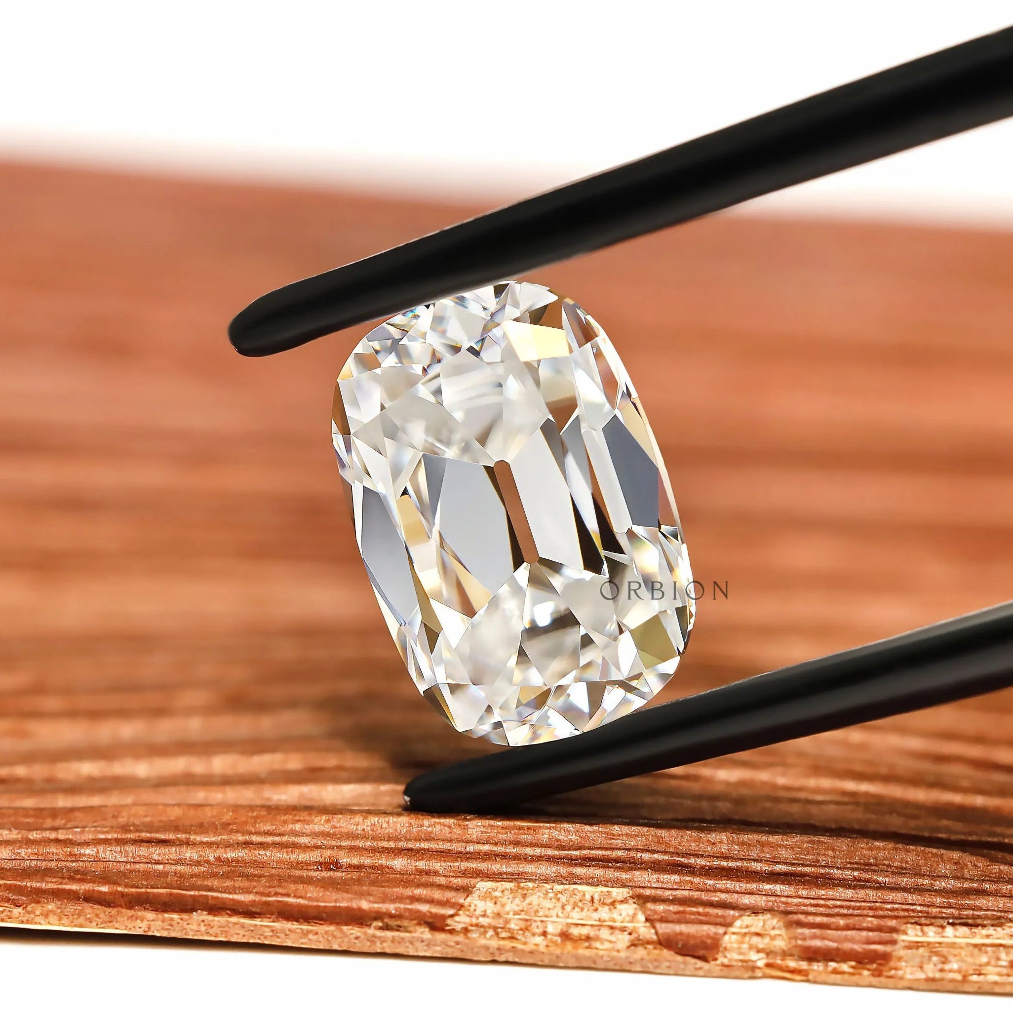 Vintage Inspired Elongated Cushion Moissanite with Antique Faceting