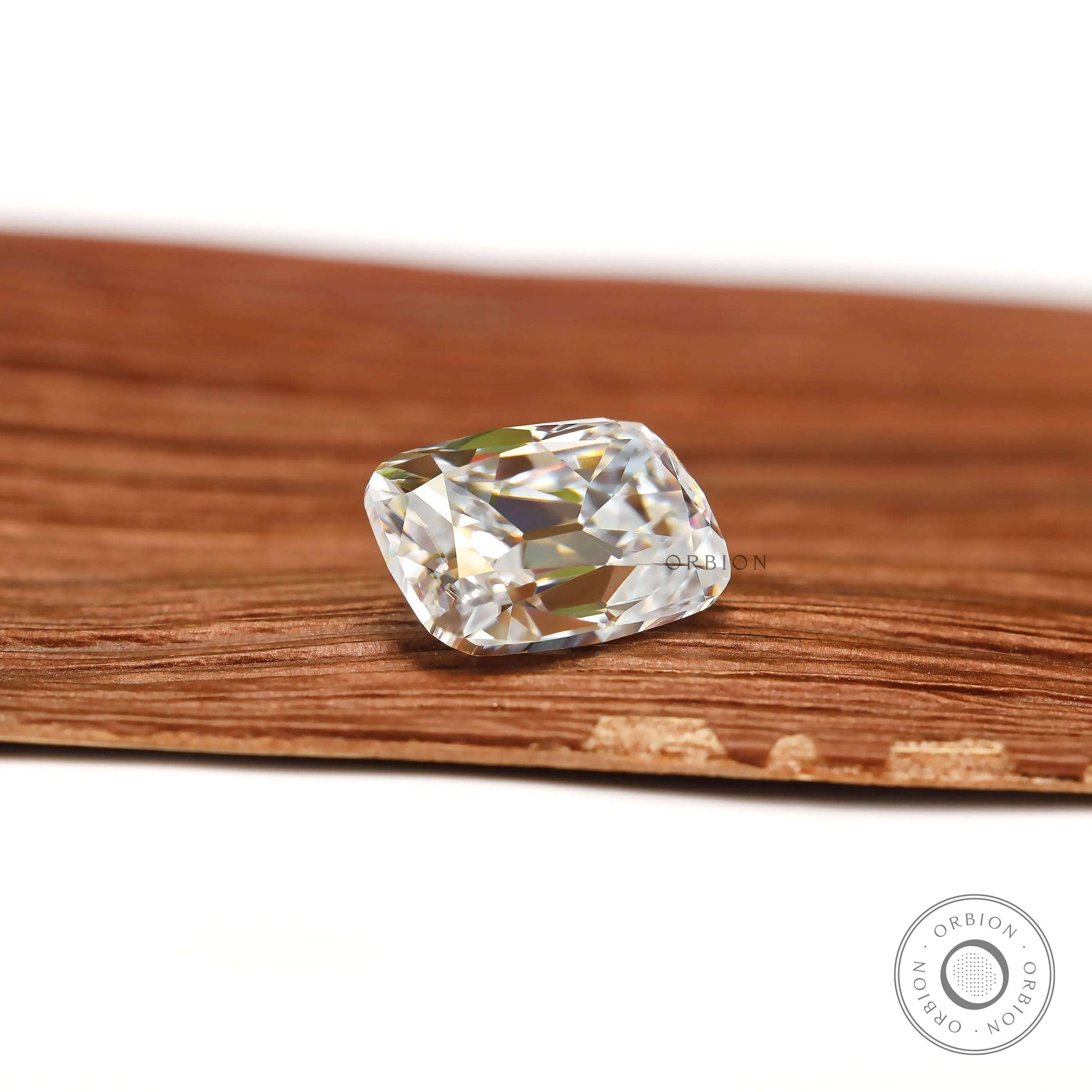 Colorless moissanite elongated cushion with antique faceting