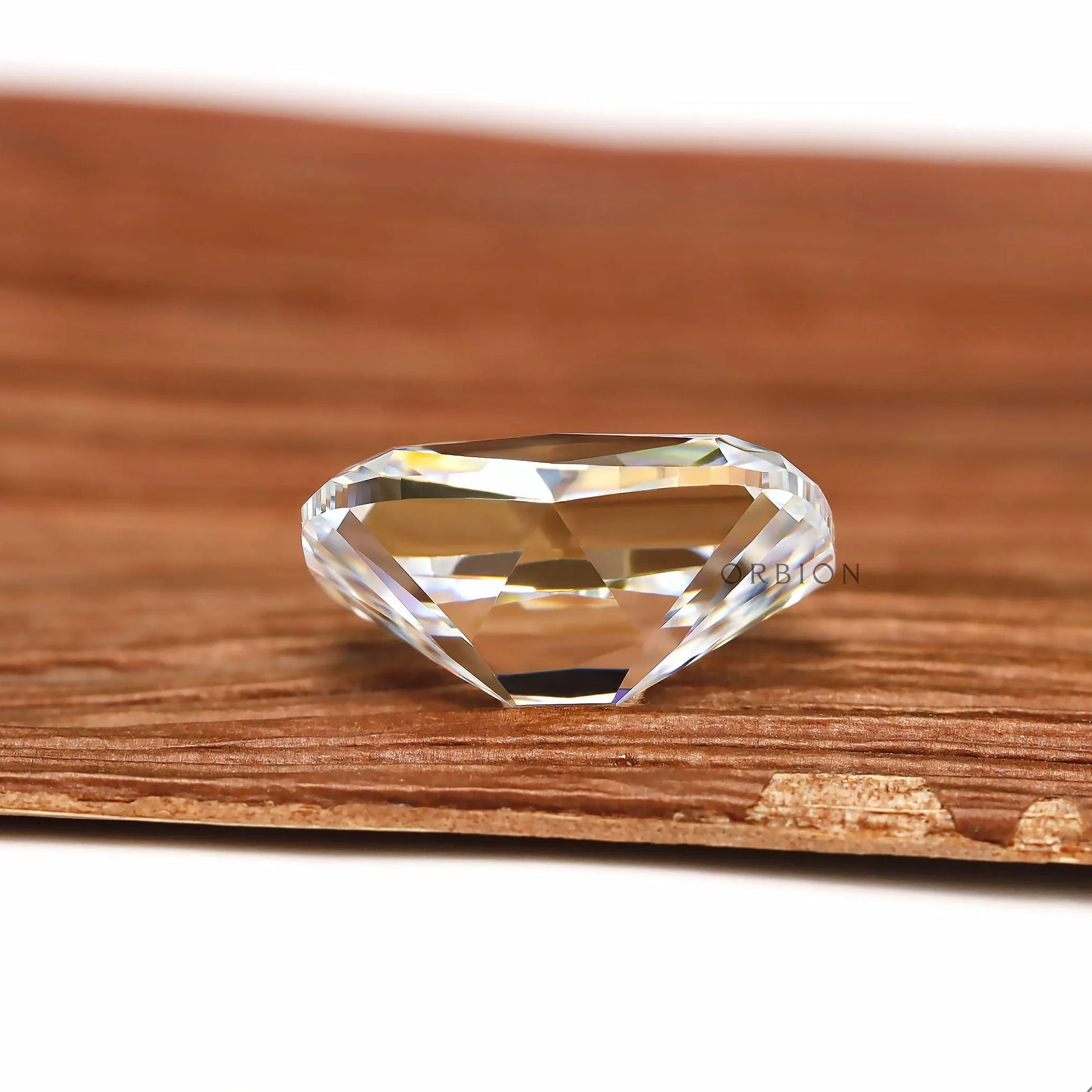 Elongated cushion omc moissanite 4.30 ct with visible bar culet