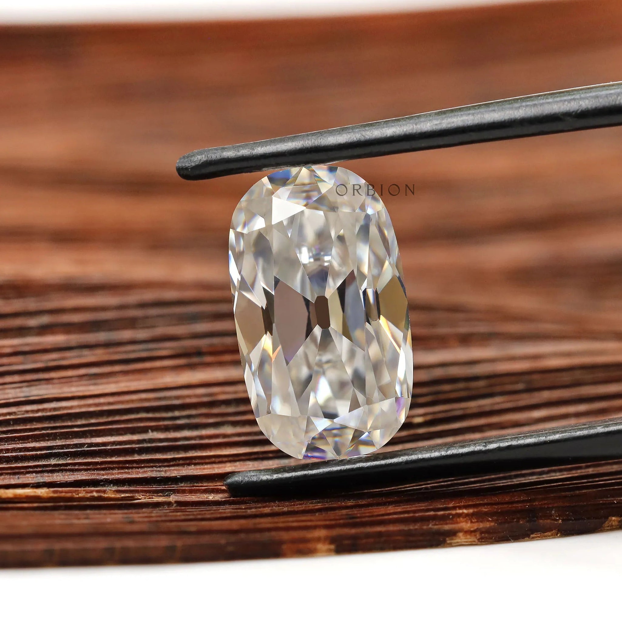 Loose colorless moissanite stone 3.80 ct elongated cushion old mine cut