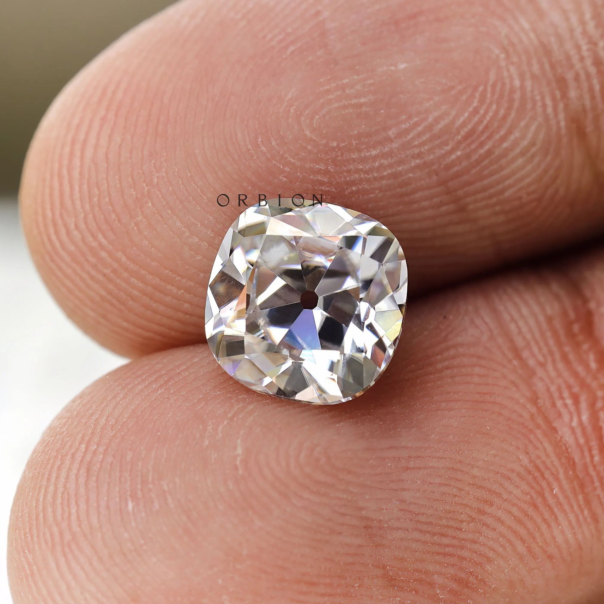 Vintage-inspired 4 CT colorless moissanite elongated cushion, old mine cut