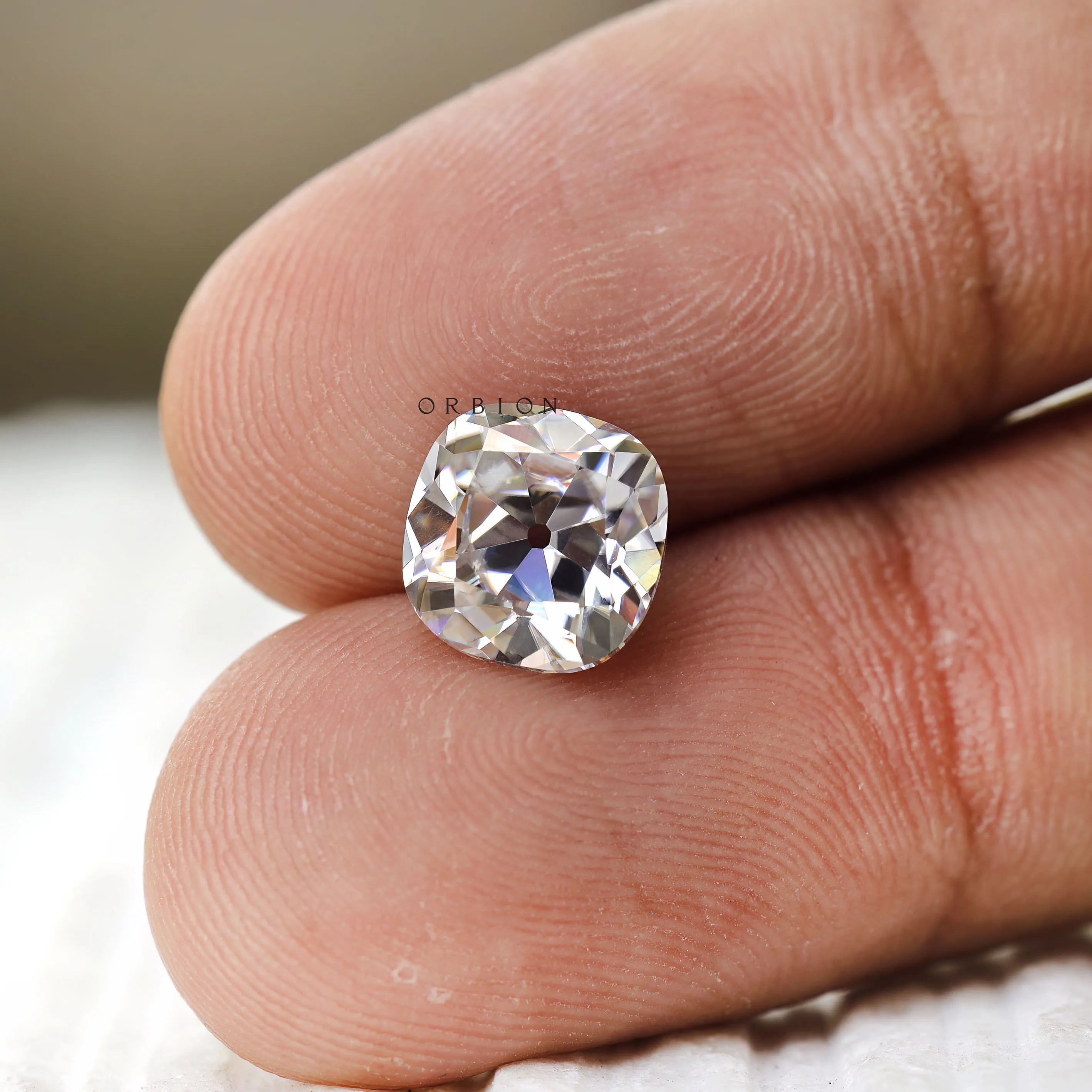 Vintage-inspired 4 CT colorless moissanite elongated cushion, old mine cut