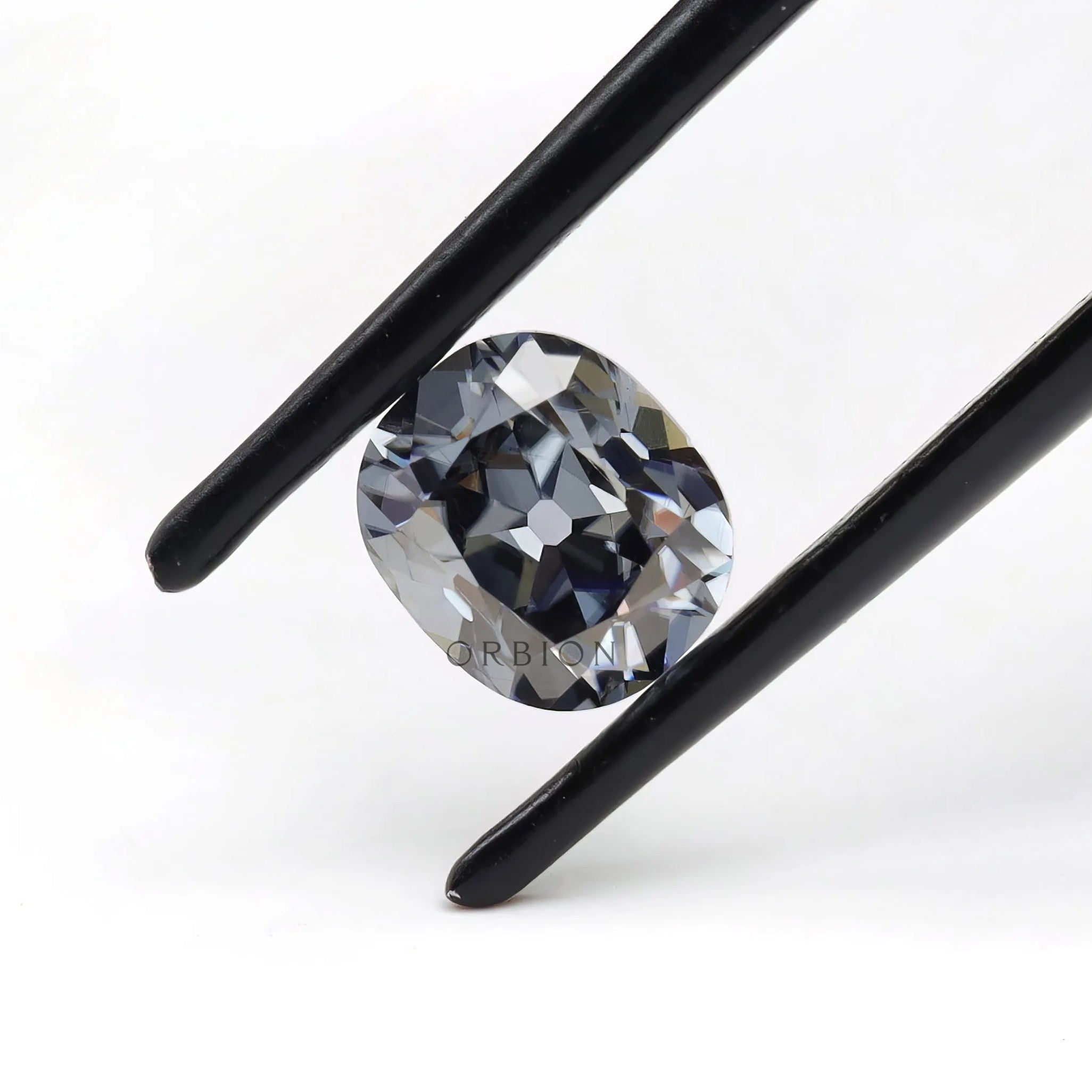 Dark grey elongated cushion moissanite 1.20 ct vintage old mine cut stone