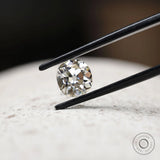 Elongated cushion moissanite with warm color depth and vintage look