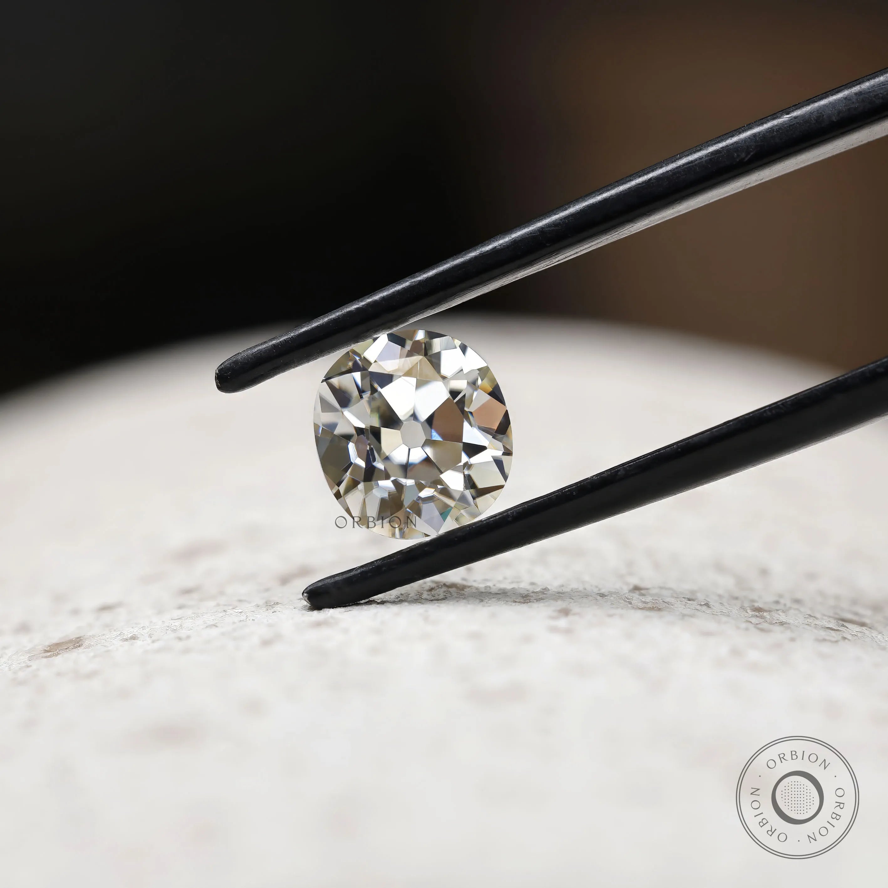 Elongated cushion moissanite with warm color depth and vintage look