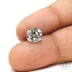 Old mine cut elongated cushion off white moissanite