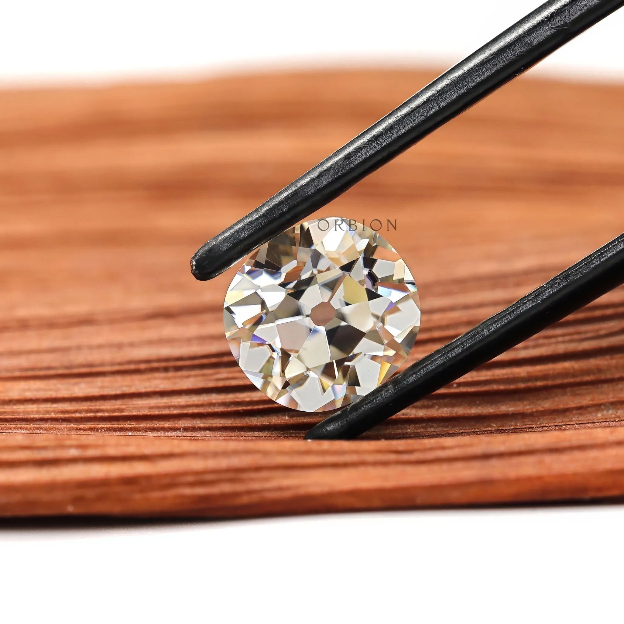 Warm color moissanite stone elongated cushion shape old mine style