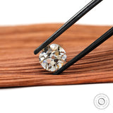 Elongated cushion moissanite 2.40 ct in soft off white tone with antique cut