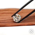 2.40 ct off white moissanite with vintage elongated cushion faceting