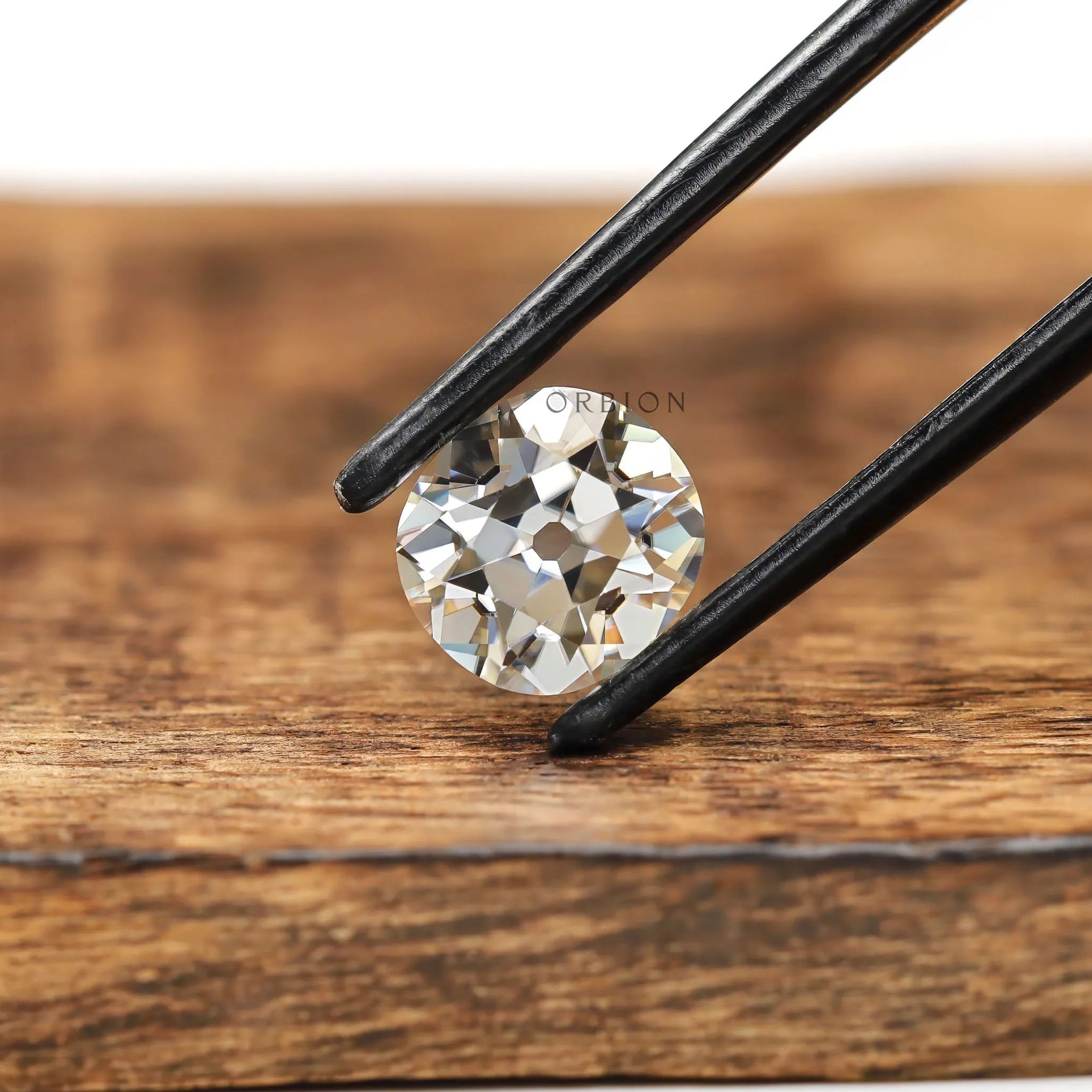 Elongated cushion warm tone moissanite for custom engagement ring