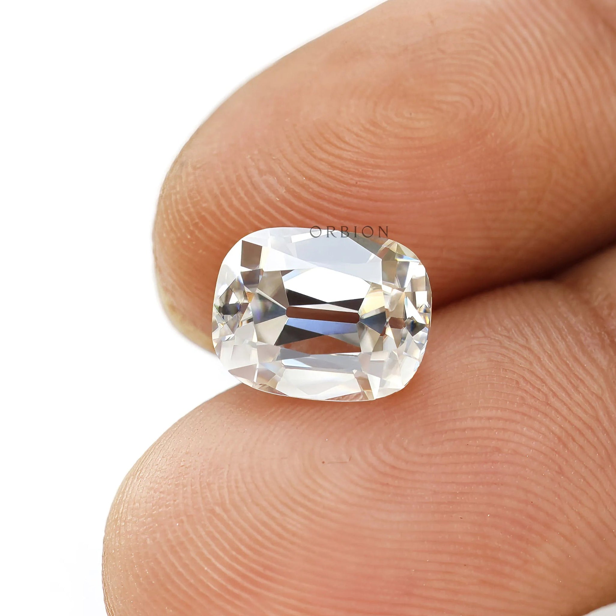 Moissanite Elongated Cushion Stone on Finger GHI Color