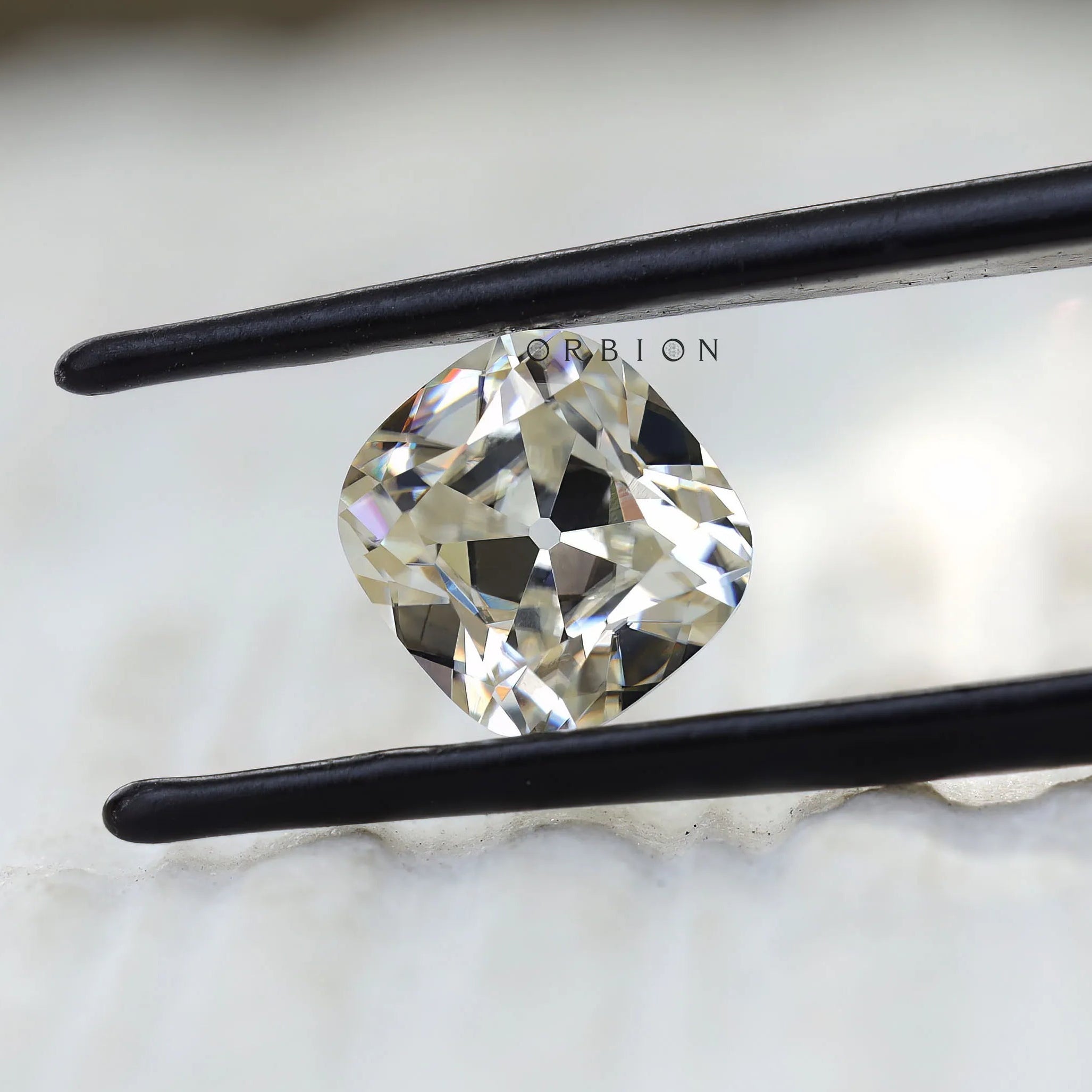 3 CT Cushion moissanite stone with off white color and old mine faceting