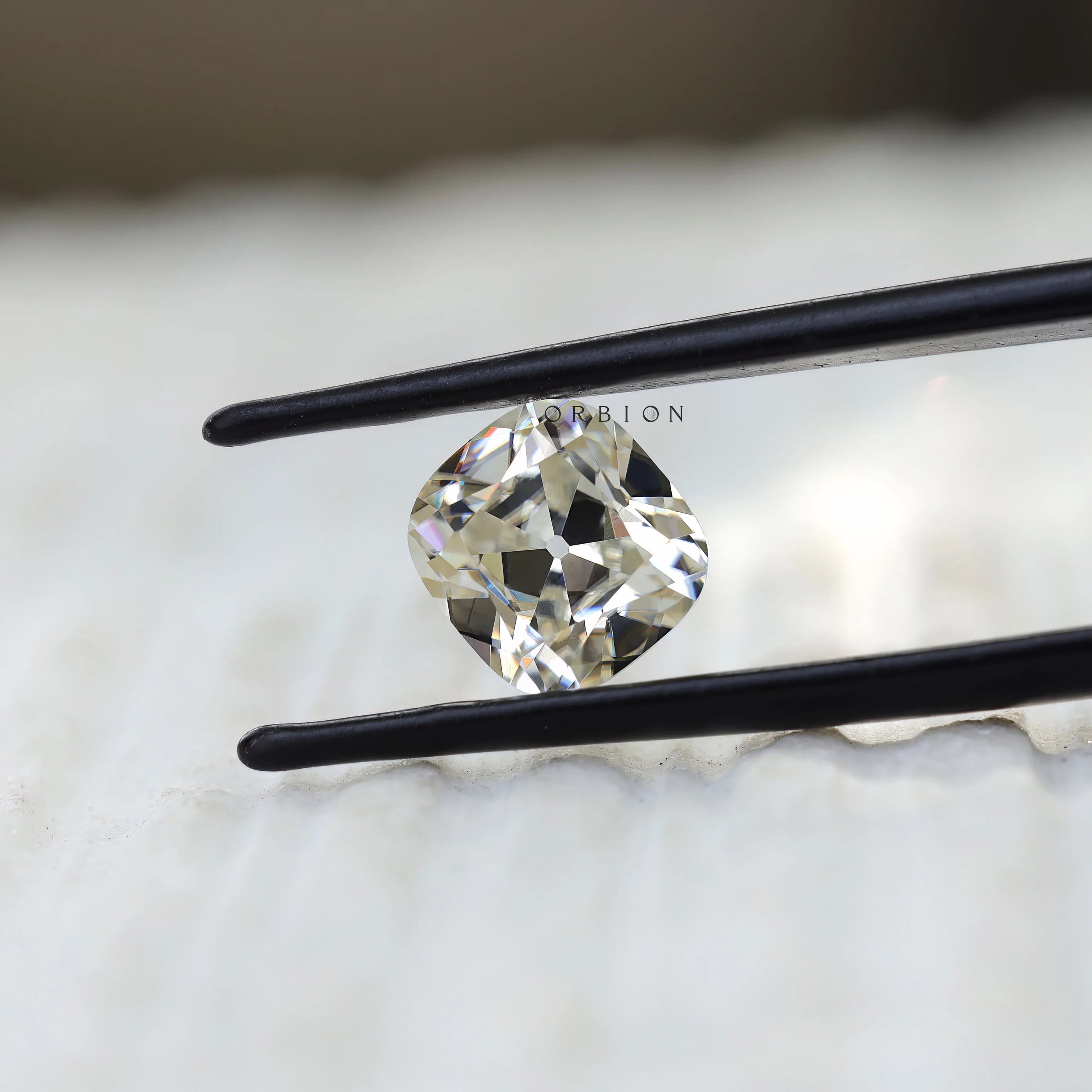 3 CT Cushion moissanite stone with off white color and old mine faceting