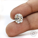 3 ct elongated cushion moissanite off white tone with old mine faceting