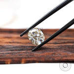 Vintage inspired elongated cushion moissanite stone with warm hue