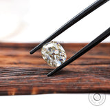 Vintage inspired elongated cushion moissanite stone with warm hue