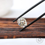 Off white elongated cushion moissanite loose gemstone with antique cut