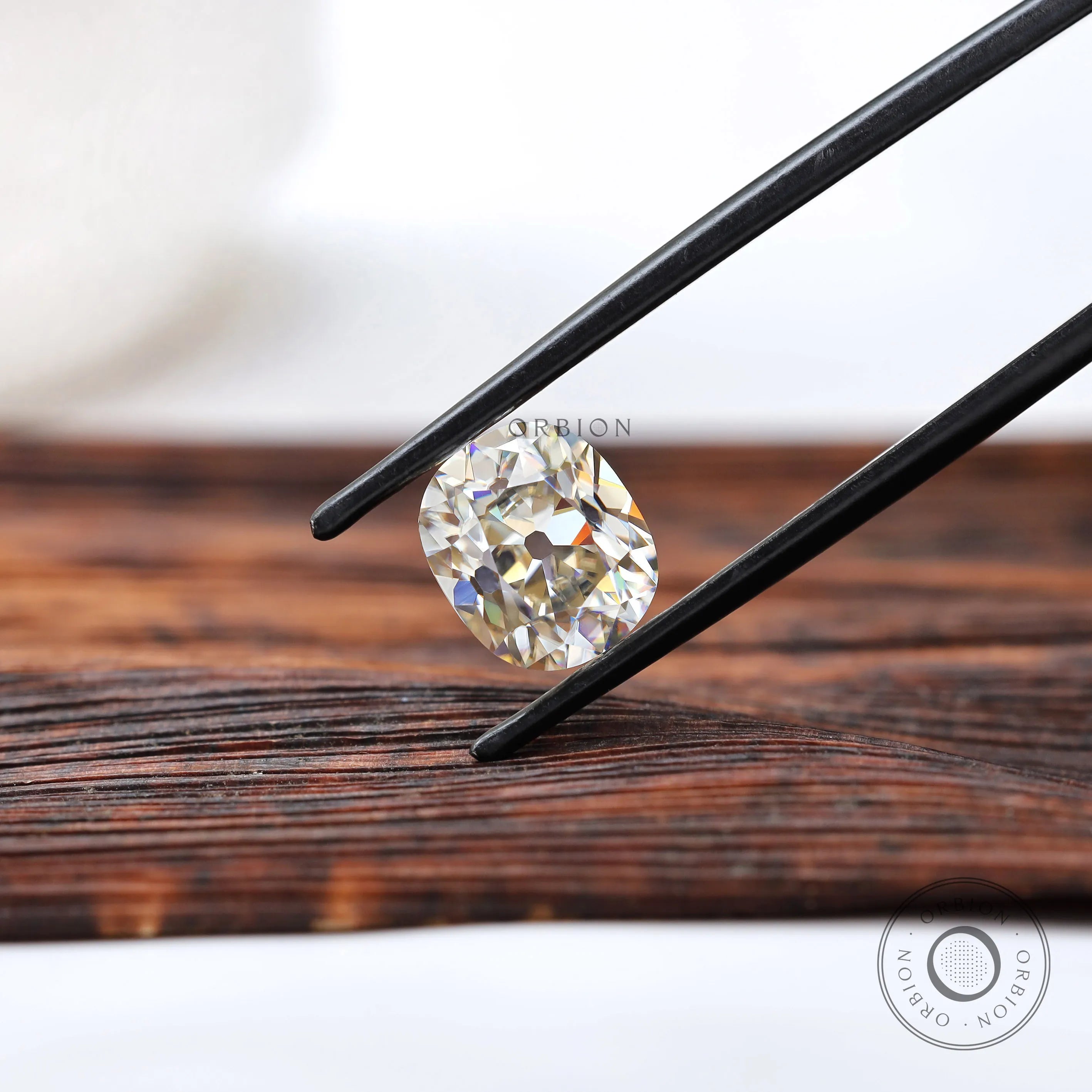 Off white elongated cushion moissanite loose gemstone with antique cut