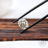 3 ct moissanite elongated cushion shape with subtle creamy tone