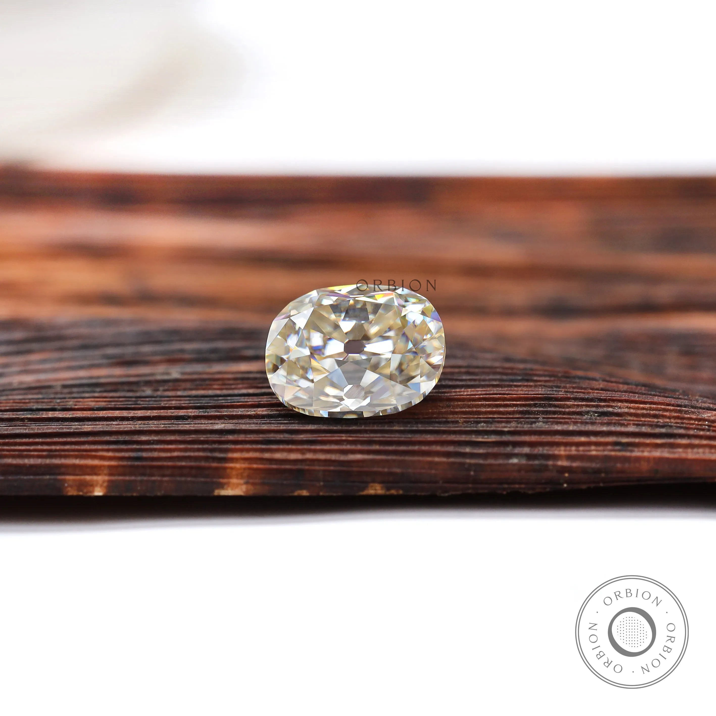 Warm toned elongated cushion moissanite stone for custom jewelry