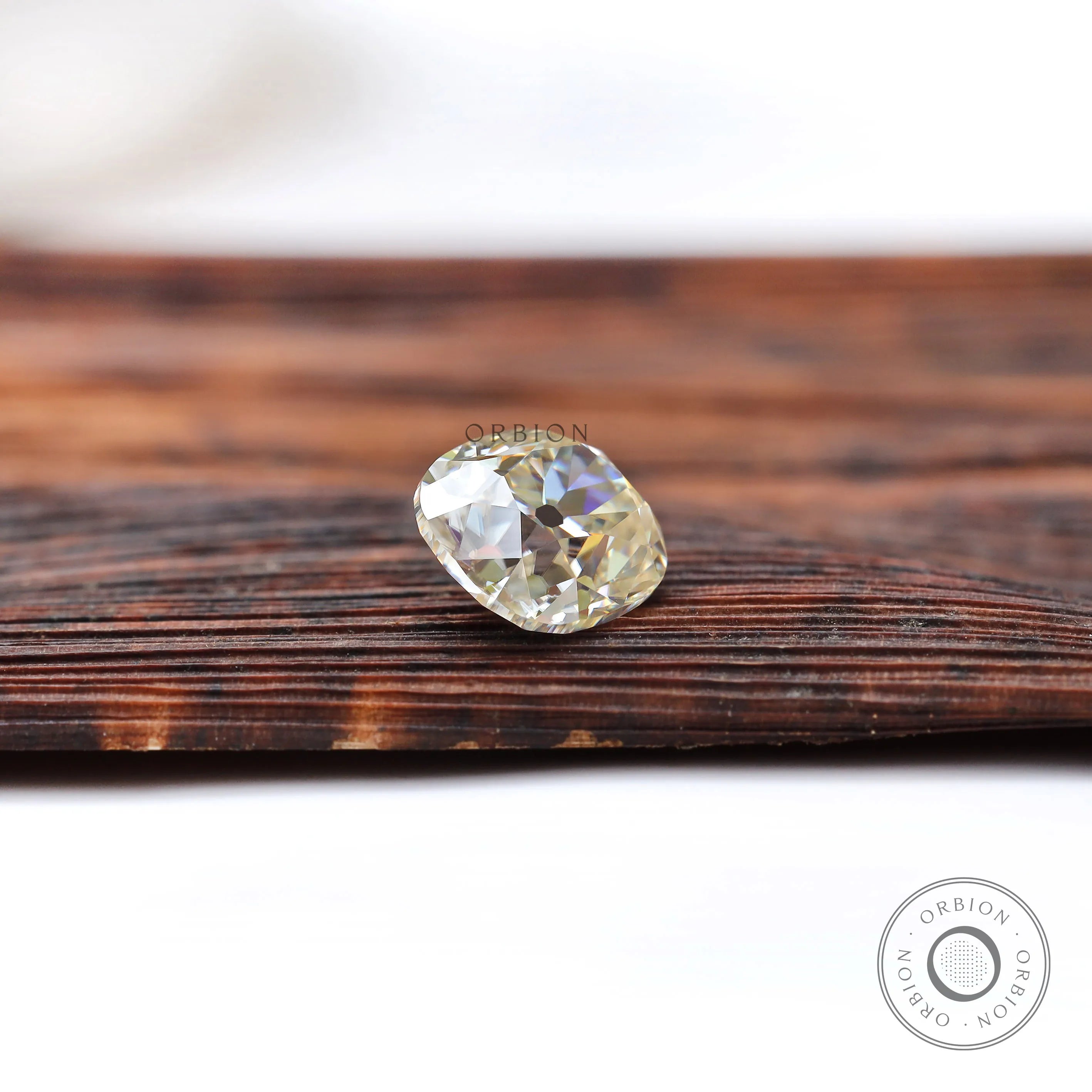 Classic antique cut moissanite elongated cushion in off white shade