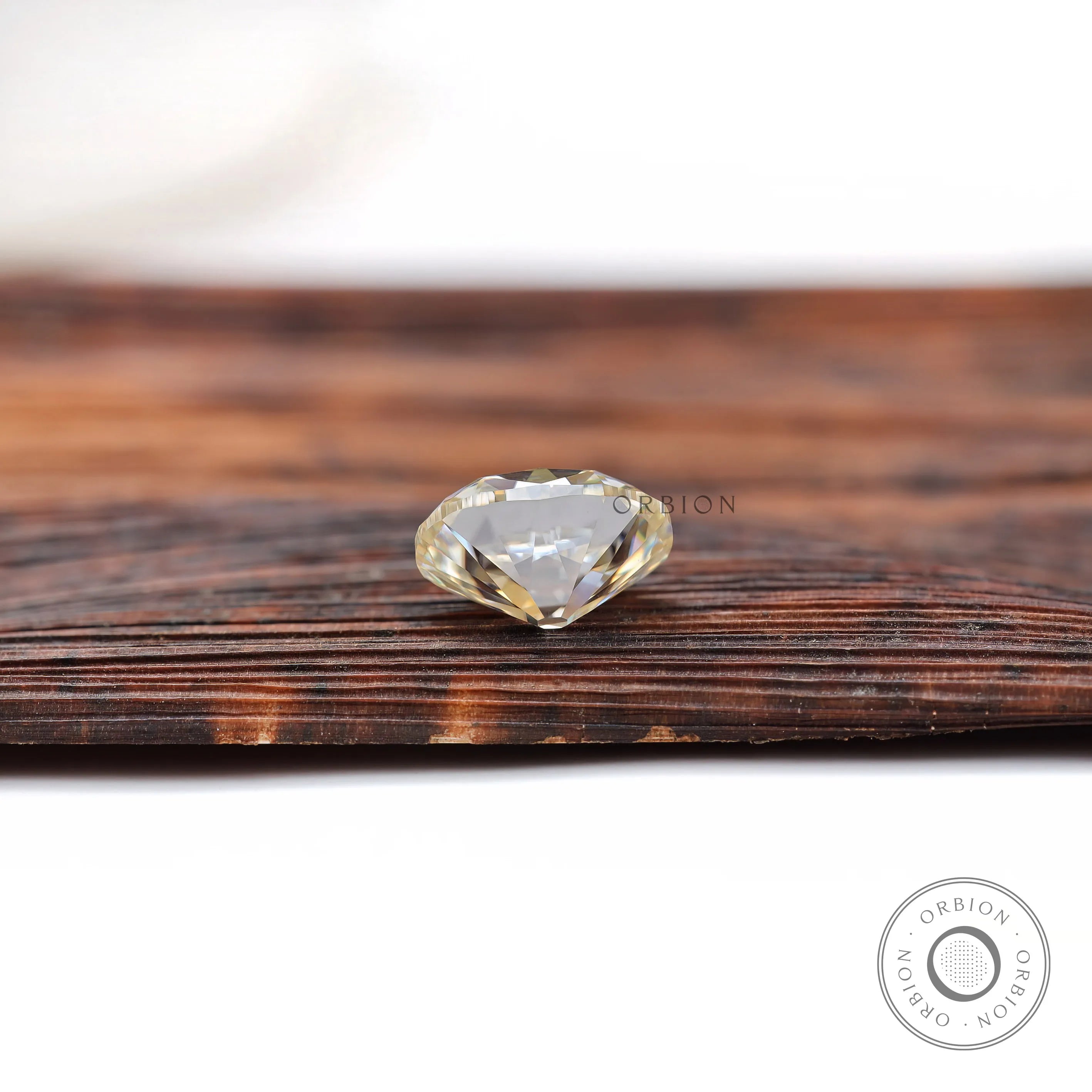 3 ct elongated cushion moissanite with vintage faceting and soft color