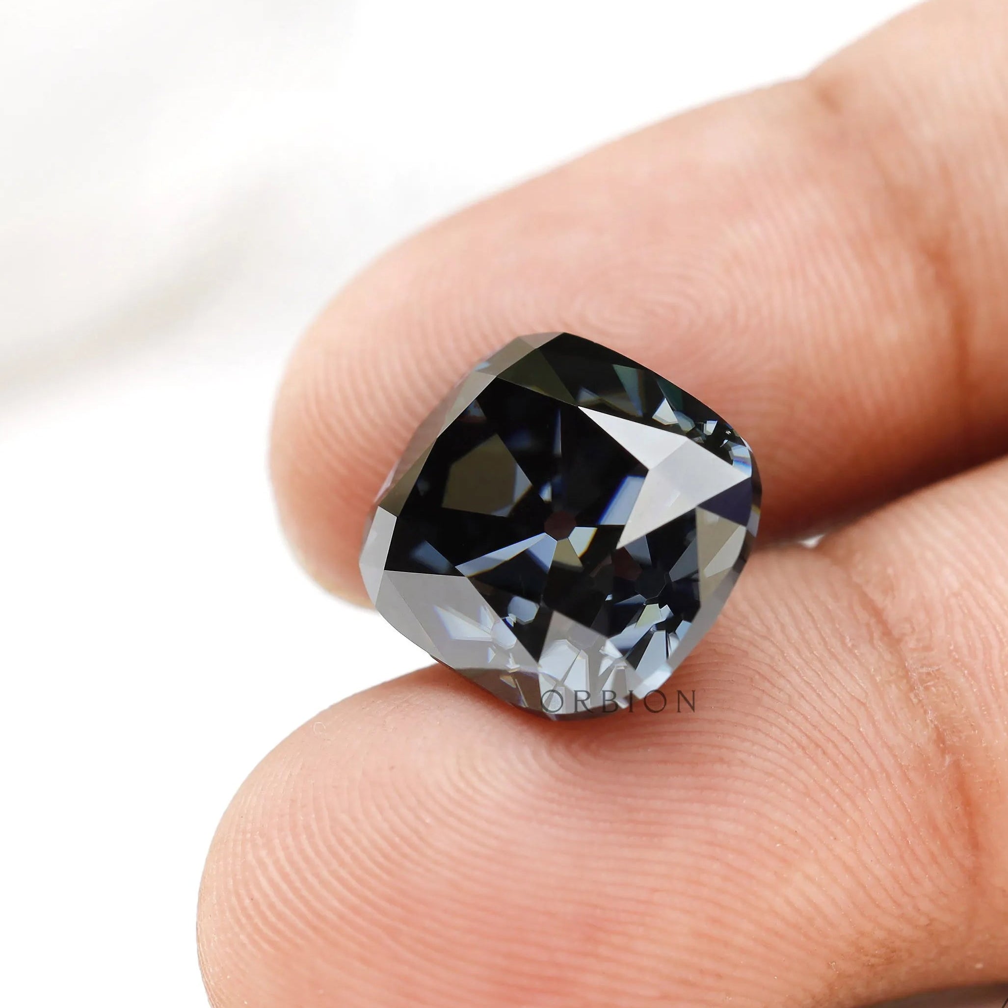 Custom jewelry elongated cushion moissanite in dark steel grey shade