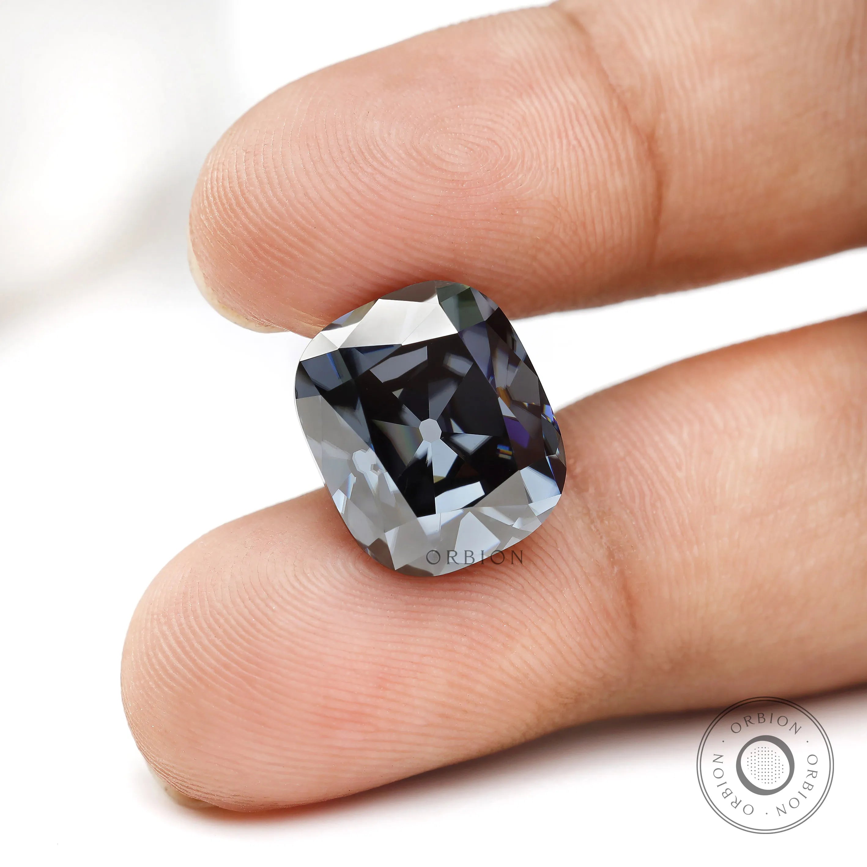 Elongated cushion moissanite with vintage faceting and grey brilliance