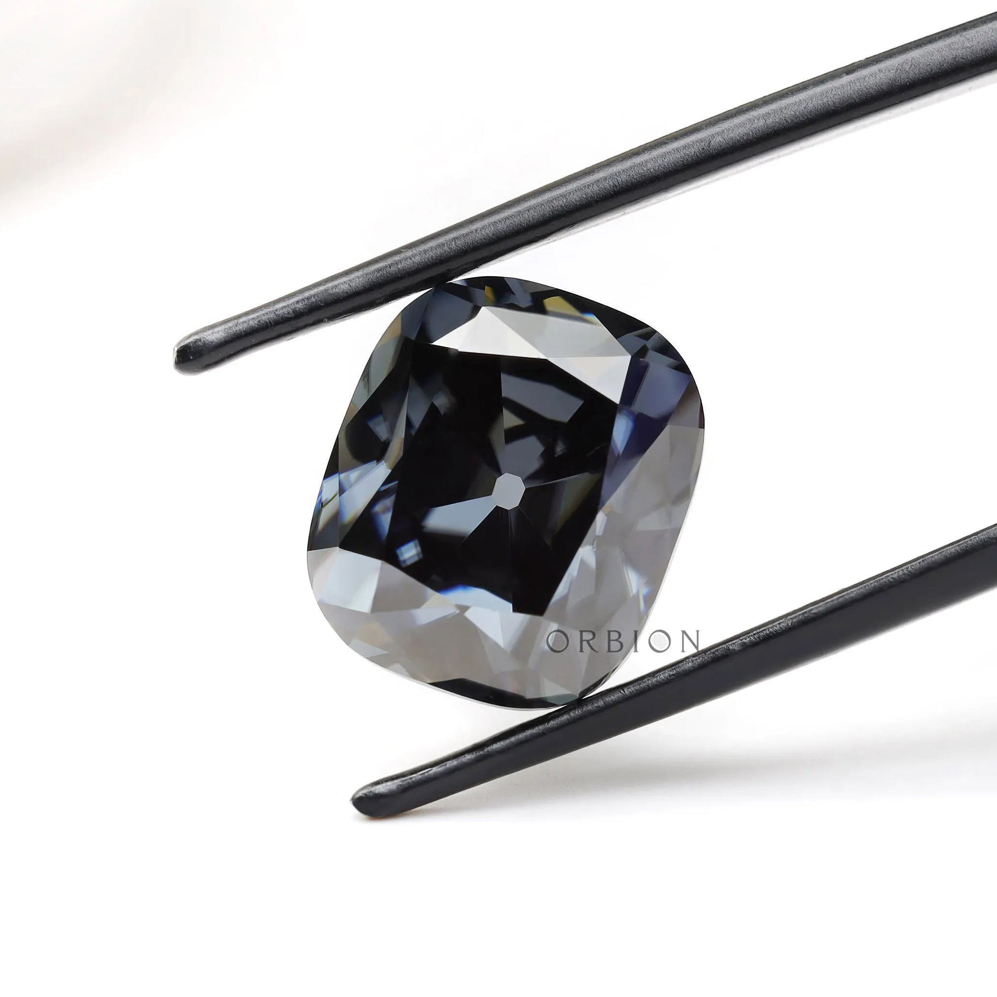 Bold elongated cushion moissanite stone with deep grey color 8 ct