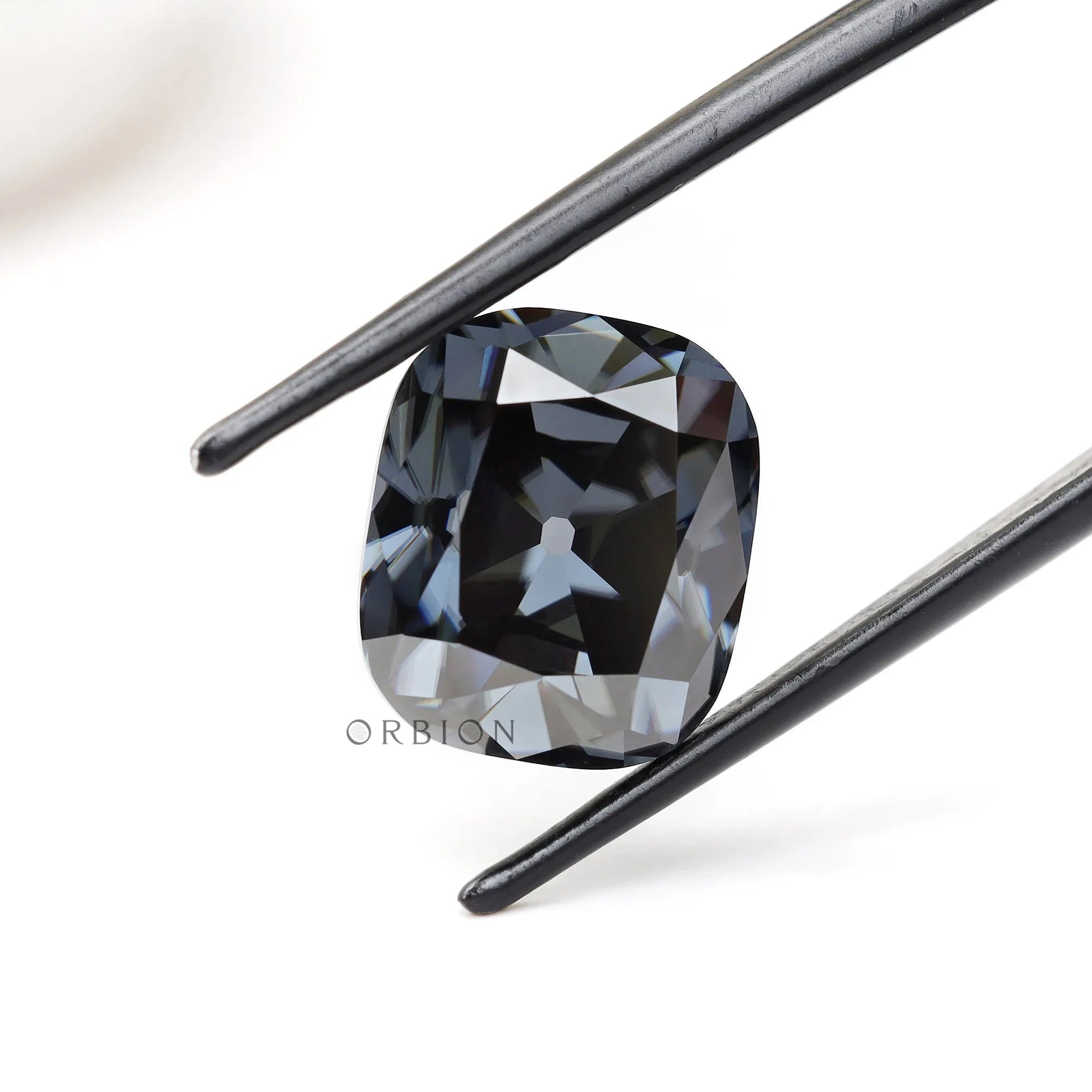 8 ct Elongated cushion moissanite in dark grey tone with antique cut