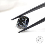 Elongated cushion moissanite with smoky grey hue and antique finish