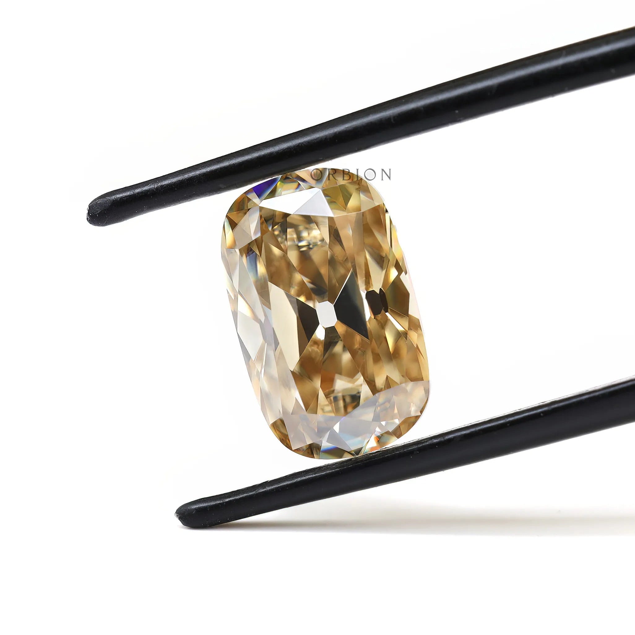Elongated cushion light champagne moissanite Old Mine Cut