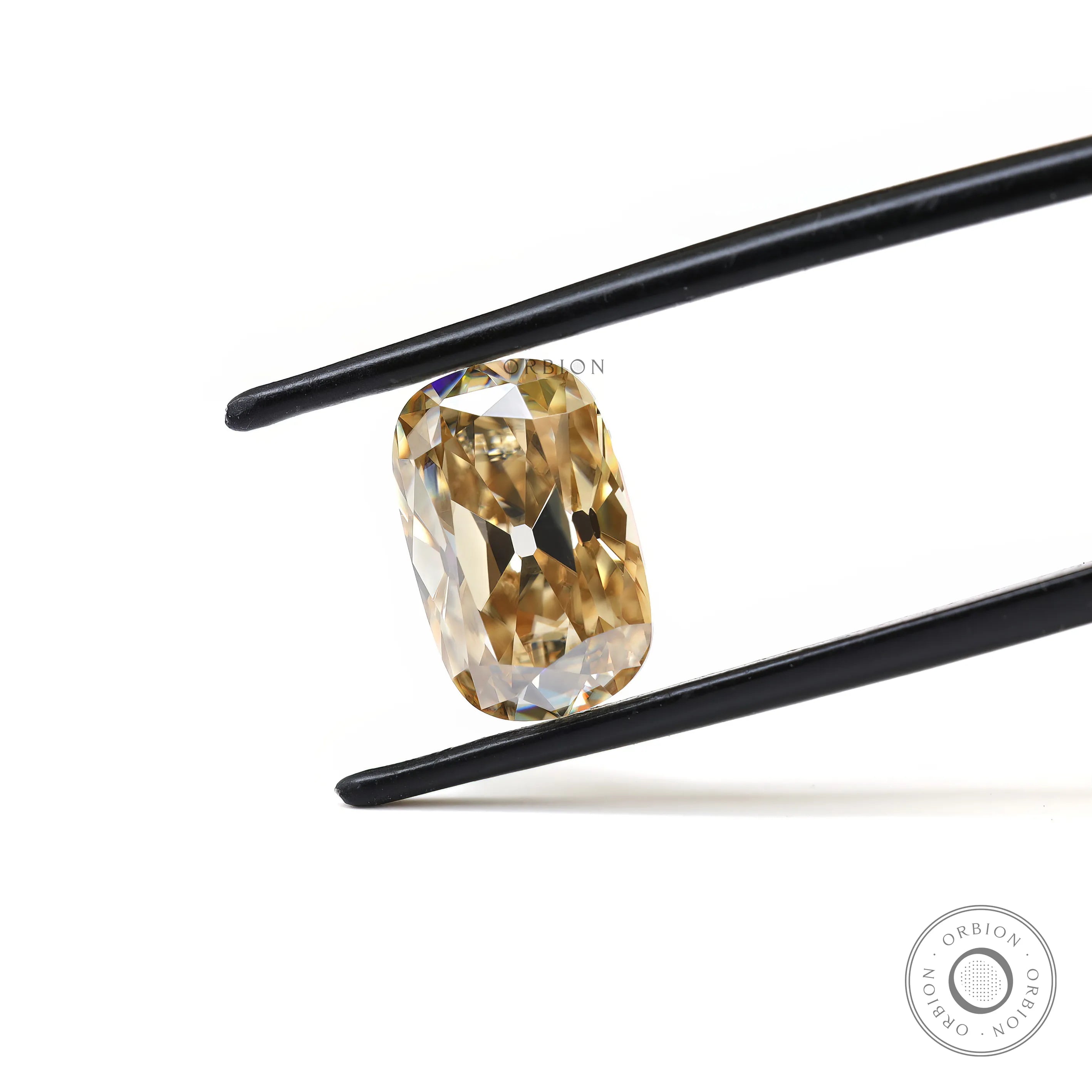 Elongated cushion light champagne moissanite Old Mine Cut