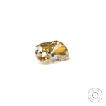 Light champagne moissanite facet detail close-up