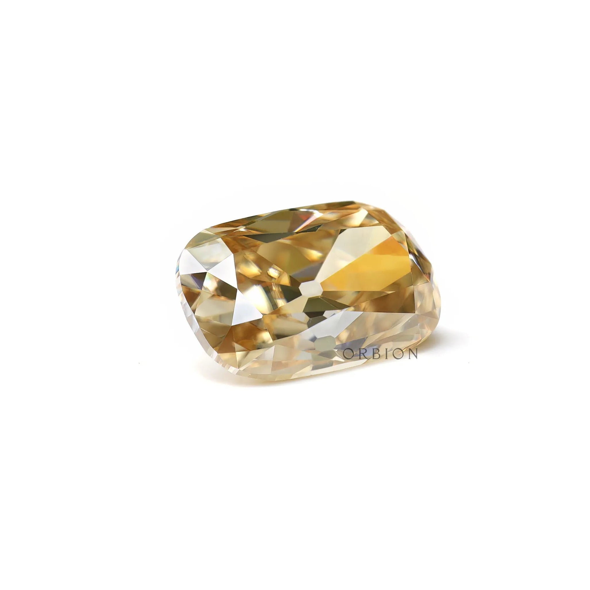 Light champagne moissanite facet detail close-up
