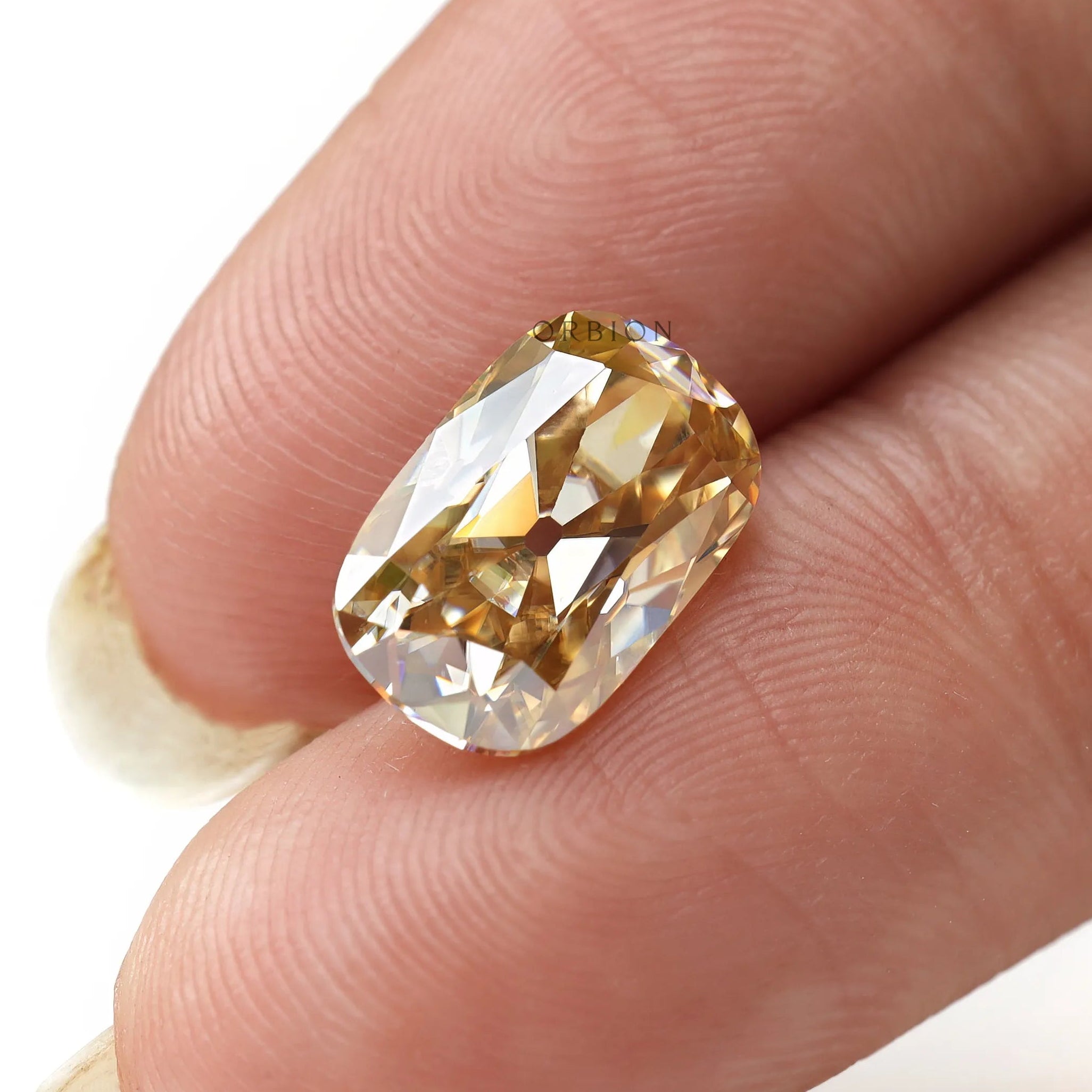 Loose champagne moissanite elongated cushion top view