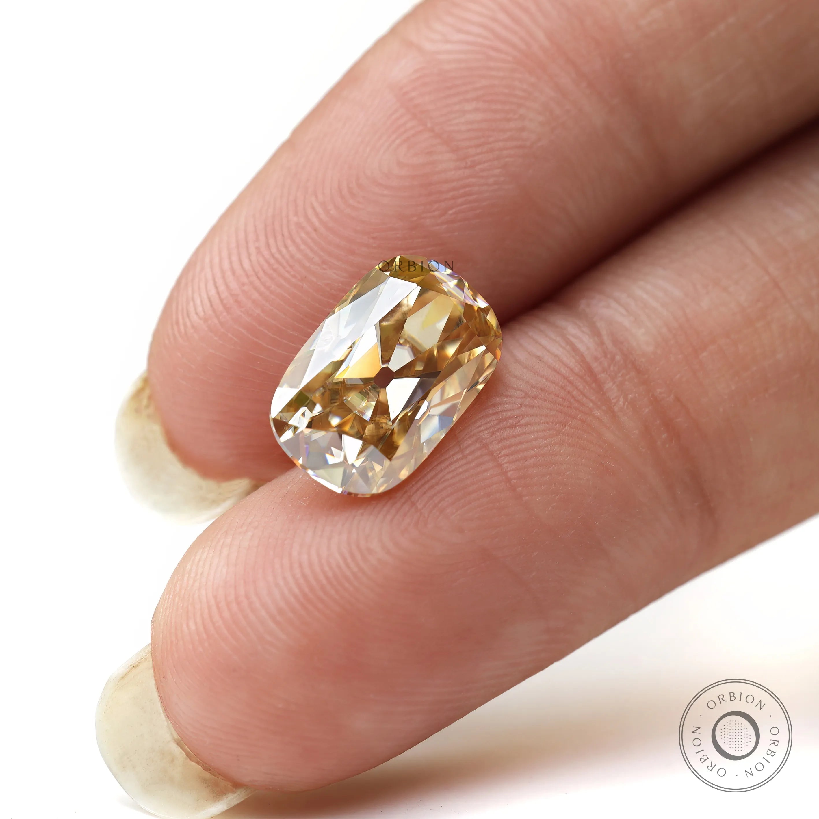 Loose champagne moissanite elongated cushion top view