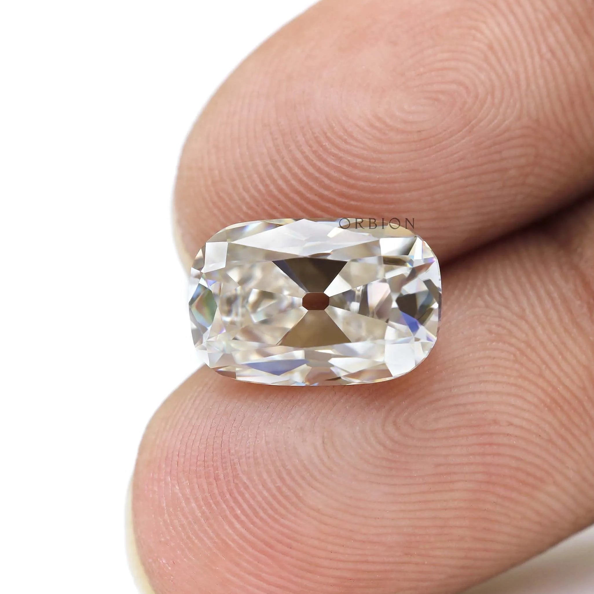 Off white elongated cushion omc moissanite 4 carat