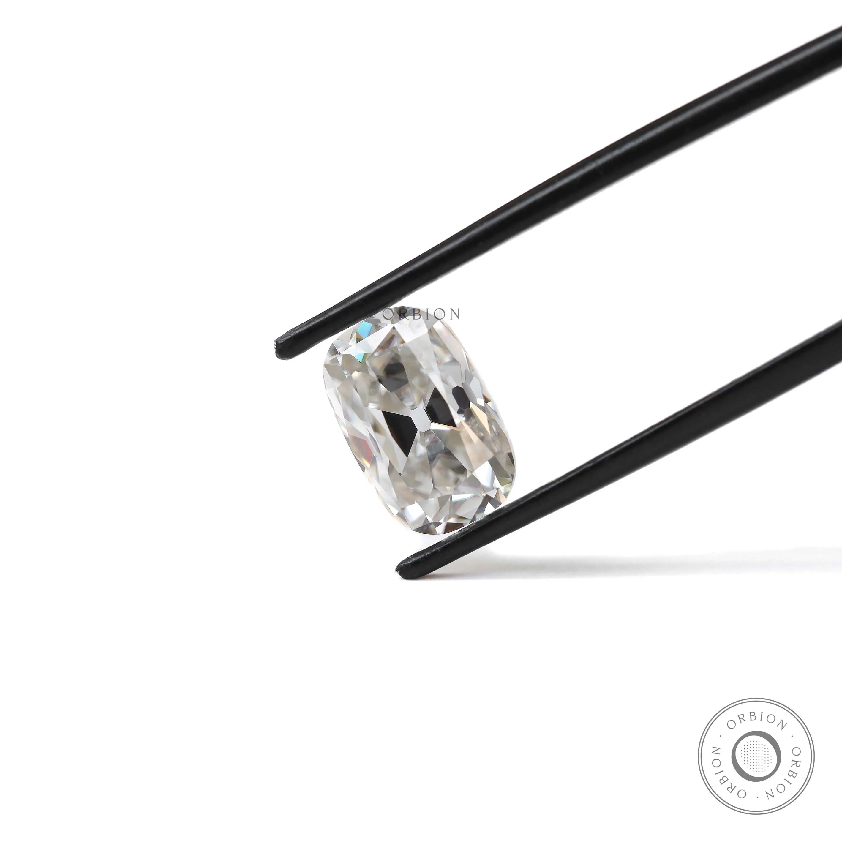 4 ct Elongated cushion moissanite with warm off white hue old mine cut