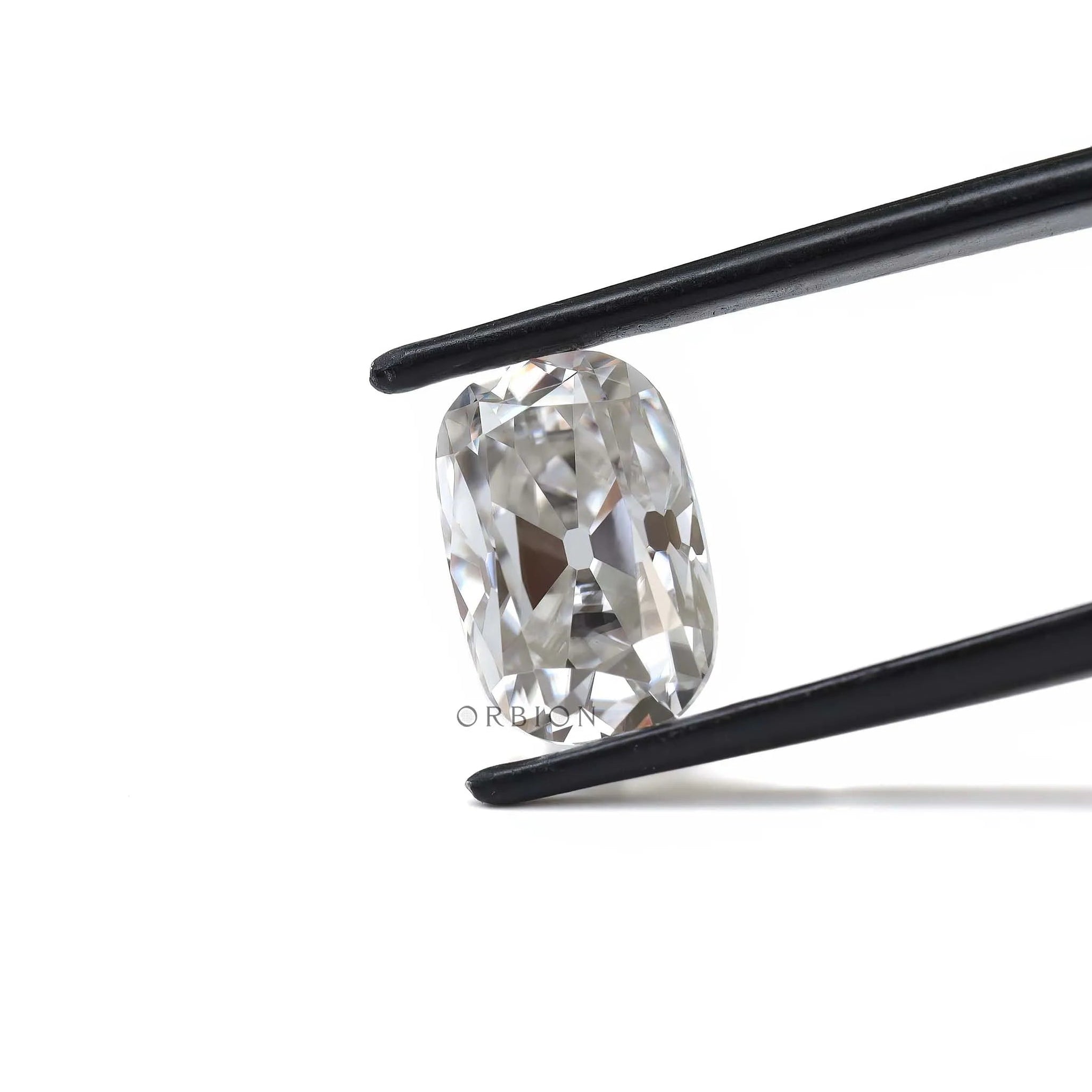 4 ct Elongated cushion moissanite with subtle off white brilliance