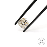 1.70 ct Elongated cushion moissanite with warm off white hue old mine cut